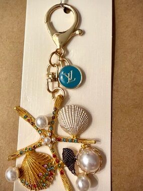 Gold-Tone Sea Life Charm Keychain with Turquoise Logo